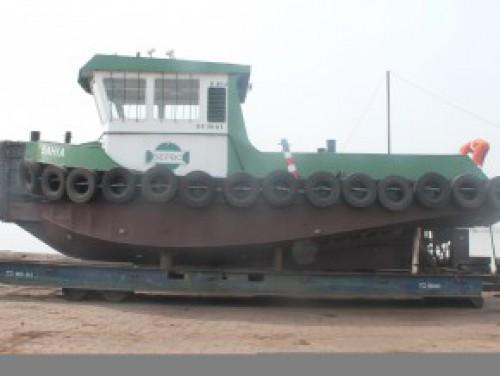 Douala port lumber yard top receive tugboat to accelerate ship loading