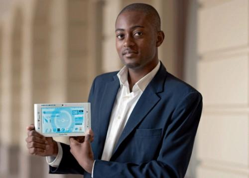 Cameroonian engineer Arthur Zang exhibits Cardiopad during Health Forum of Geneva